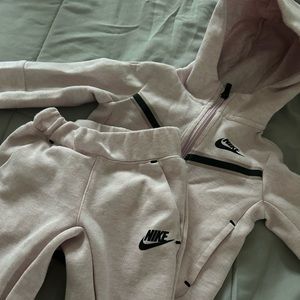 Light pink Nike Tech